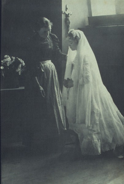 Young woman at her first communion with an attendant, c1900.