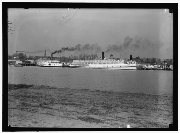 Ships on Potomac River: Three Rivers, left, and Northland, right; U. S. Capitol dome visible in distance.