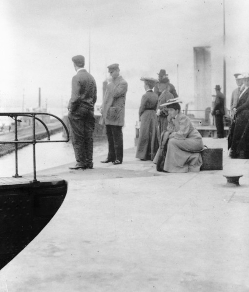 Passengers waiting to board a freighter at the locks at Sault Sainte Marie, Michigan, 1903.