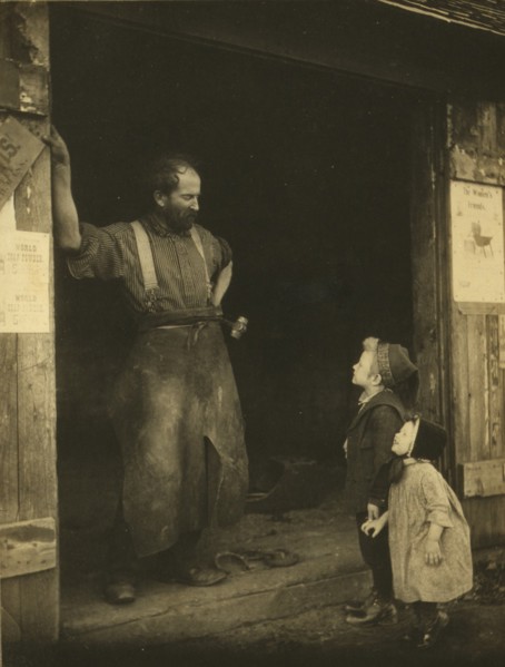 A "crack" with the blacksmith, c1900. Creator: Frances S. Allen.
