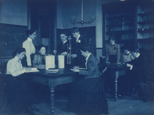 Students conducting electrical experiments with batteries, Western High School, Washington, D.C., (1899?).