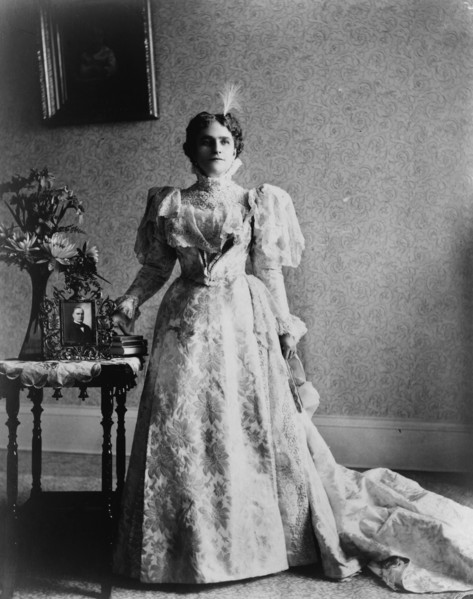 Ida S. McKinley, full-length portrait, standing, facing front, between 1890(?) and 1900(?). Creator: Frances Benjamin Johnston.