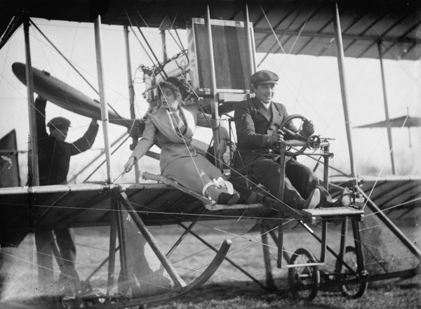 Senorita Lenore Riviero [sic] with Anthony Jannus; In Rex Smith Aeroplane, 1912. Creator: Harris & Ewing.