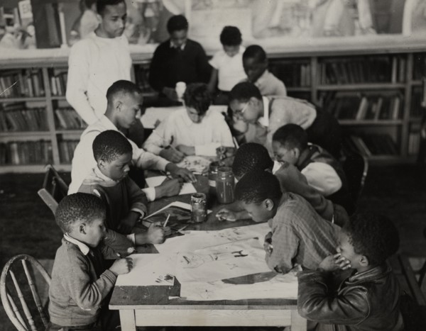 Oliver Harrington supervises class studying mural work, Hudson Ave Boys' Club, 1936.