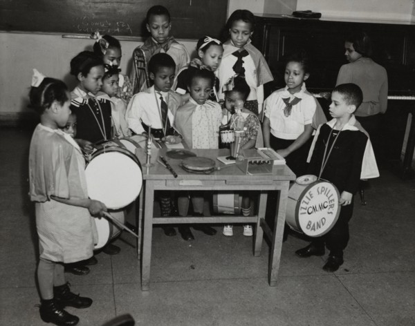 Drum students around a table, 1938.