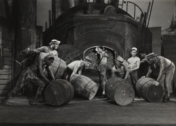 Men moving barrels, 1936.