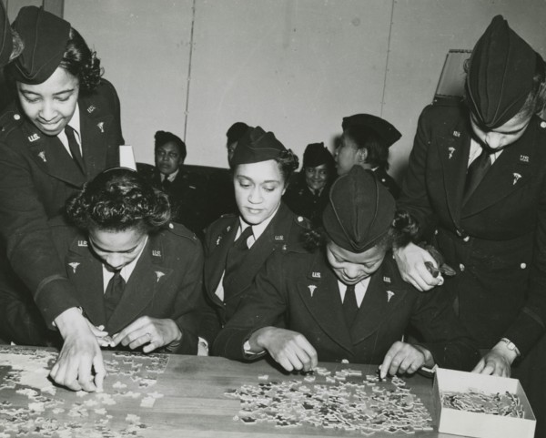 Two African American Lieutenants of the Women's Army Corps sitting at a table and..., 1939 - 1945. Creator: Unknown.