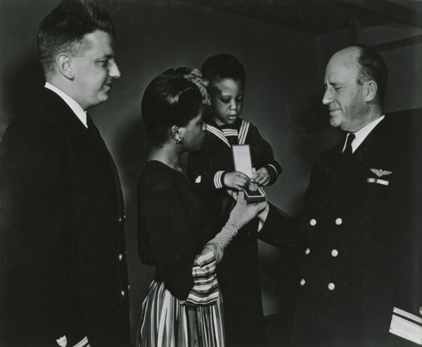 Mrs. Charles W. David, Jr.; African American widow and her three-year-old son, Neil..., 1939 - 1945. Creator: United States Coast Guard.