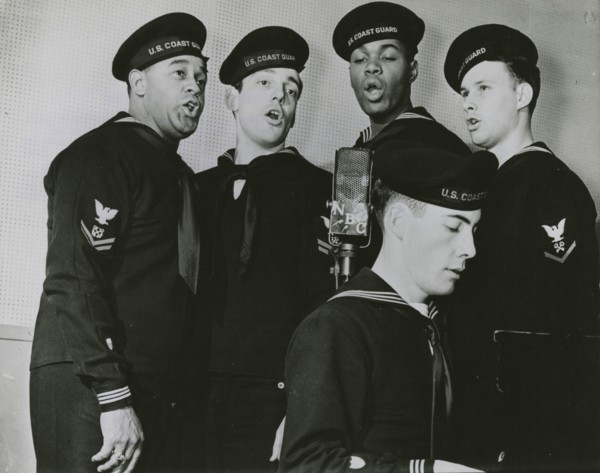 Group photograph of the U.S. Coast Guard Quartet members while singing, New York, N.Y., 1939 - 1945.