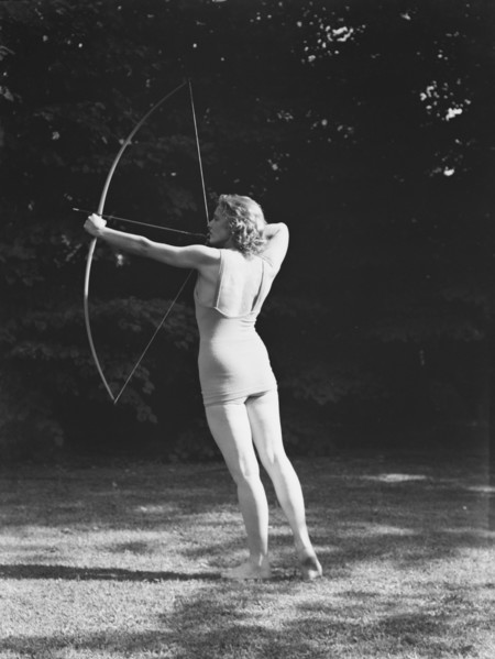 Chase, Diana, Miss, doing archery, 1933 June 22. Creator: Arnold Genthe.