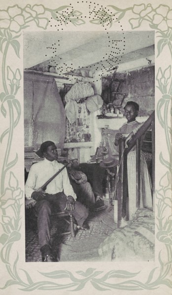 Man seated with banjo next to woman at stairs, 1903. Creator: Camera Club.