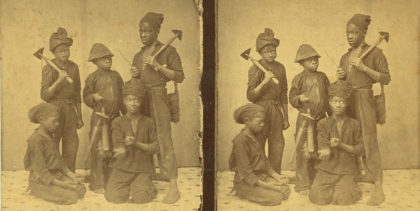 Studio portait of young chimney sweeps, (1868-1900?). Creator: J. N. Wilson.