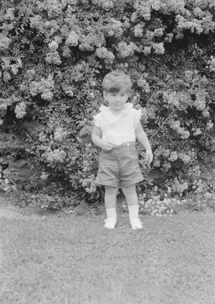 Javits, Benjamin, child of, standing outdoors, 1933 July. Creator: Arnold Genthe.