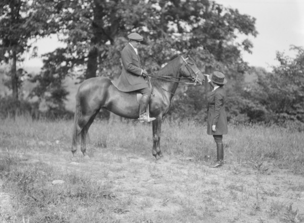 Bruce, J.M., Mr., on horseback, with Mrs. Bruce, 1919 May 30. Creator: Arnold Genthe.