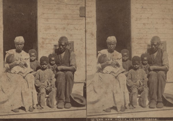The New South family circle, [Family group on a porch], (1868-1900?). Creator: Unknown.