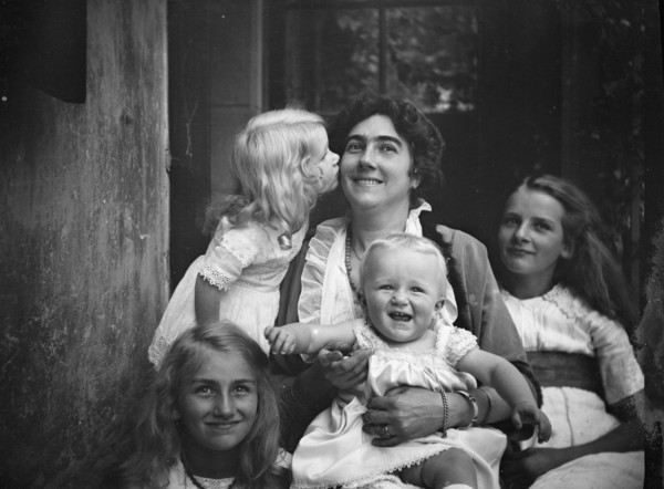 Unidentified woman with four children, portrait photograph, between 1911 and 1942. Creator: Arnold Genthe.
