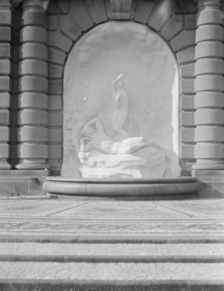 Fountain and sculpture in the gardens at Kijkuit, John D. Rockefeller's estate..., 1917 Creator: Arnold Genthe.