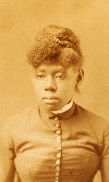 Portrait of unidentified young woman with buttoned bodice and band collar, (1880-1889?). Creator: H. A. Insley.