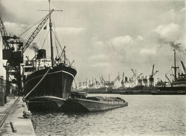 Merchants Bring In Wares By Ships from Every Nation Vessels alongside the Quays...', 1937. Creator: J Dixon-Scott.
