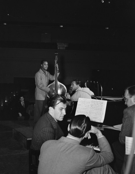 Portrait of Eddy Duchin, Wesley Prince, Nat King Cole, and Oscar Moore, New York, ca. July 1946. Creator: William Paul Gottlieb.