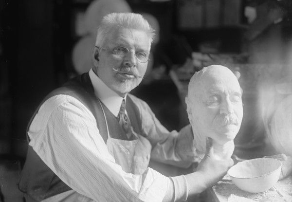 U.S.J. Dunbar with Death Mask of Admiral Dewey, 1917. Creator: Harris & Ewing.