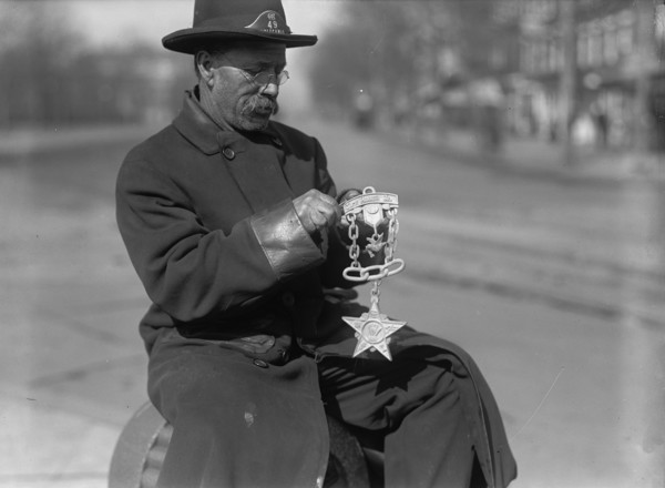 Grand Army of The Republic - G.A.R. Emblem Carved in Wood By Switchman at Peace Monument, 1917. Creator: Harris & Ewing.