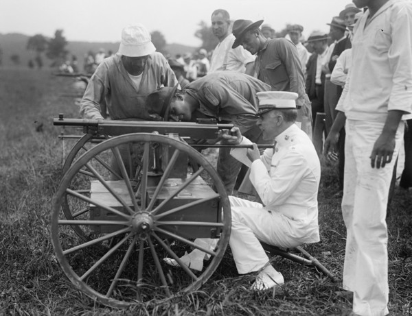 Marine Corps Rifle Range, Winthrop, Md. - Gen. Barnett Testing Colt's Automatic Machine Gun, 1917. Creator: Harris & Ewing.