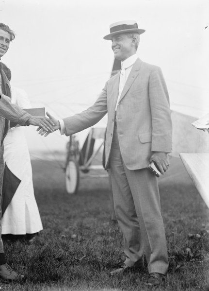 Maj. Edgar Russell, Signal Corps, U.S.A., Right, Shaking Hands with Aviator Wood, 1911. Creator: Harris & Ewing.