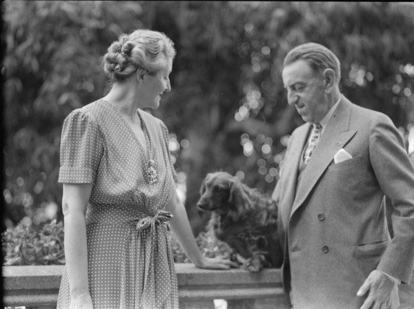 Alanson, Bertram, Mr. and Mrs., with dog, outdoors, between 1927 and 1937. Creator: Arnold Genthe.