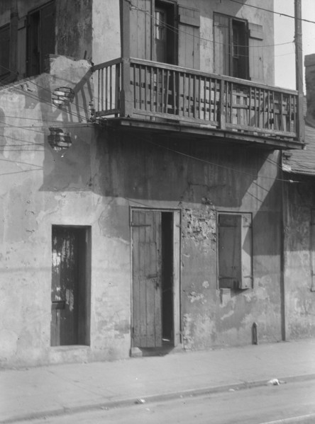 Facade of a multi-story house in the French Quarter, New Orleans, between 1920 and 1926. Creator: Arnold Genthe.