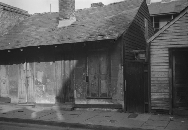Houses in the French Quarter, New Orleans, between 1920 and 1926. Creator: Arnold Genthe.