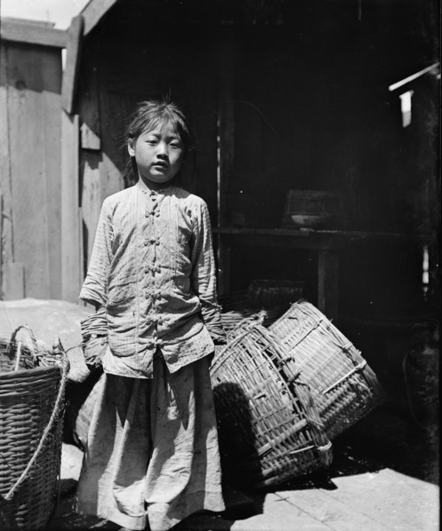 The fish dealer's daughter, Chinatown, San Francisco, between 1896 and 1906. Creator: Arnold Genthe.