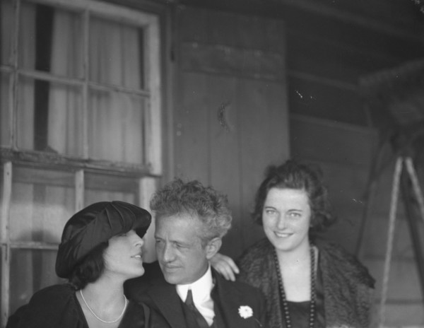 Arnold Genthe with two women friends on the porch of his bungalow in Long Beach, N.Y., c1911-c1942. Creator: Arnold Genthe.