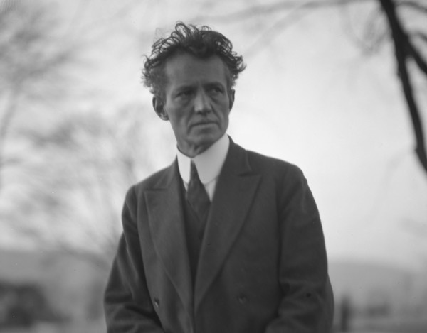 Portrait photograph of Arnold Genthe taken outdoors, between 1911 and 1942. Creator: Arnold Genthe.