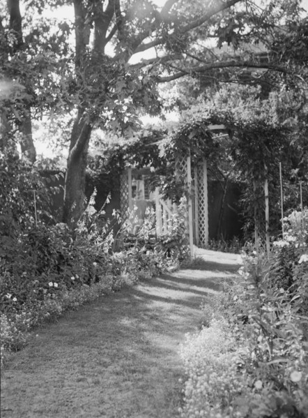 Herter, Albert, garden, between 1932 and 1942. Creator: Arnold Genthe.