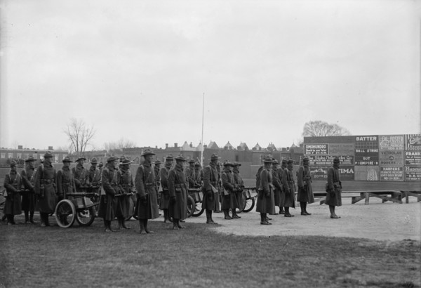 Marine Corps, U.S.N. Machine Gun Unit Demonstration at Ball Park, 1917. Creator: Harris & Ewing.