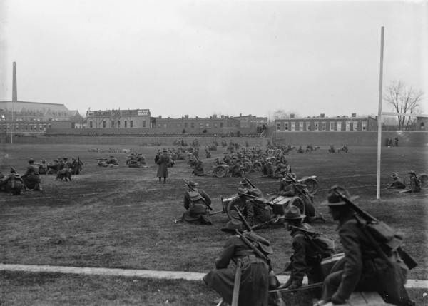 Marine Corps, U.S.N. Machine Gun Unit Demonstration at Ball Park, 1917. Creator: Harris & Ewing.