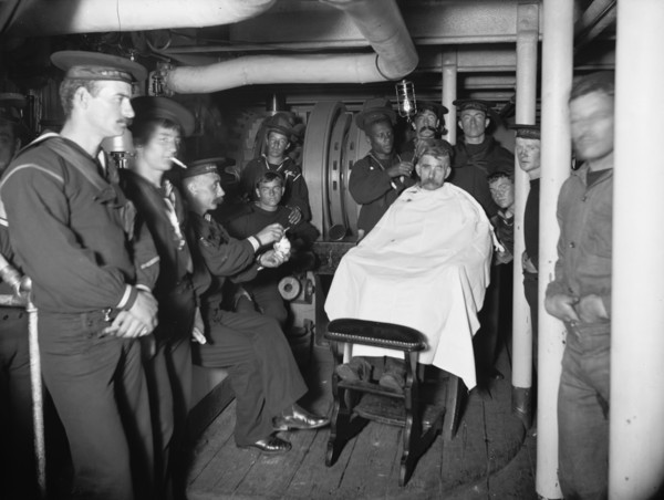 U.S.S. Brooklyn, barber shop, between 1896 and 1901. Creator: Unknown.