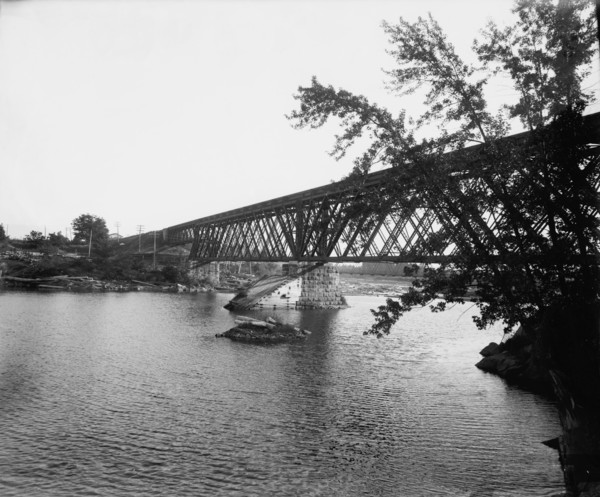 Black River Falls, Wis., railroad crossing, between 1880 and 1899. Creator: Unknown.