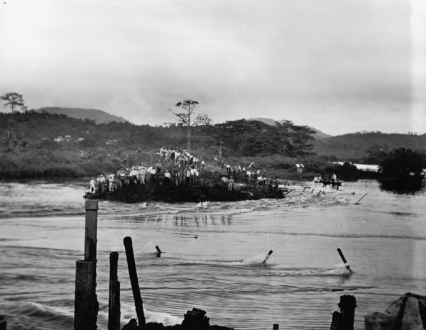 First rush of water through Gamboa dyke, Panama Canal, c.between 1910 and 1914. Creator: Unknown.