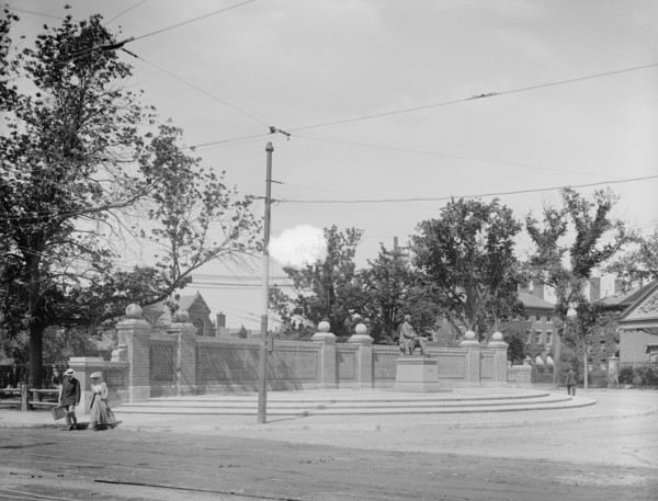 Charles Sumner statue at entrance to subway, Harvard Square, Cambridge, Mass., between 1900 and 1920 Creator: Unknown.