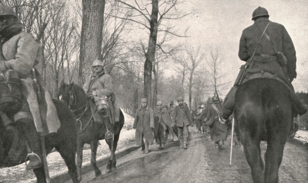 'Verdun; Apres l'attaque: 68 Allemands, pris au bois des Caures, entrent a Verdun...1916', 1924) Creator: Unknown.