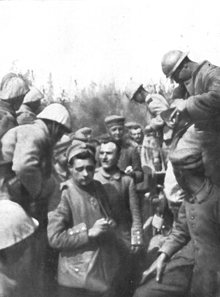 'Pendant l'action; Les premiers prisonniers du premier jour: de tres jeunes gens', 1916 (1924) Creator: Unknown.