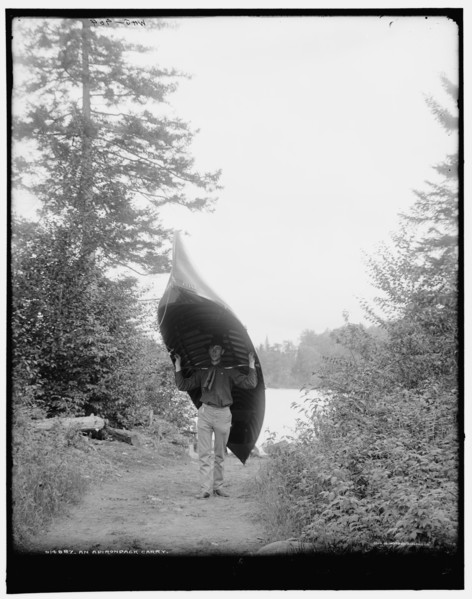 An Adirondack carry, c1902. Creator: William H. Jackson.