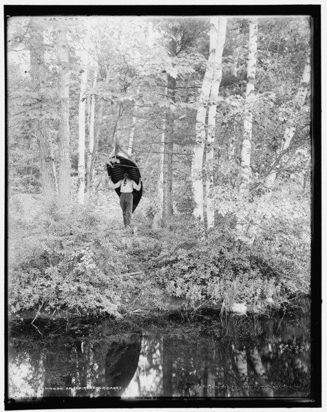 An Adirondack carry, c1902. Creator: William H. Jackson.
