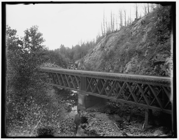 Montreal River, bridge at rock cut, Wisconsin, between 1880 and 1899. Creator: Unknown.