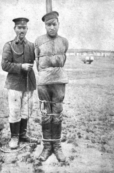 'La peine du poteau; au poteau: deux soldats russes au camp de Lamsdorf, en Silisie', 1917. Creator: Unknown.