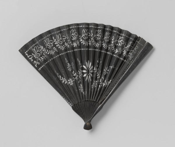 Paper mourning fan with white floral motif..., c.1850-c.1899.  Creator: Anon.