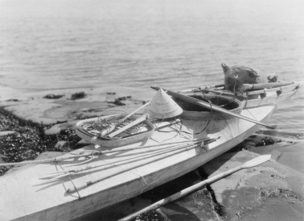 Kaiak with seal hunting equipment, Nunivak, c1929. Creator: Edward Sheriff Curtis.