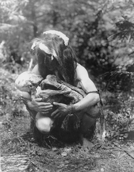 Preparing to eat the mummy, c1911. Creator: Edward Sheriff Curtis.